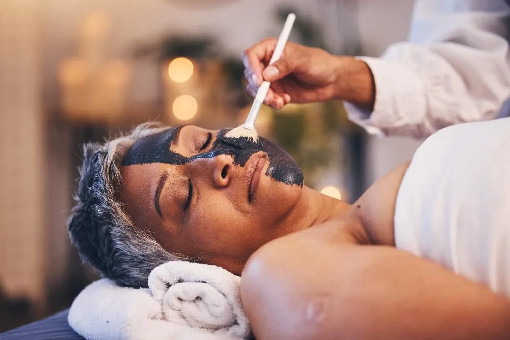 Facial Relax And Mask With A Woman In Spa Lying