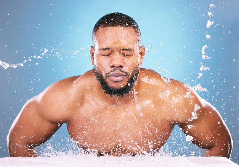 Water Splash Cleaning Or Black Man With Face Wash